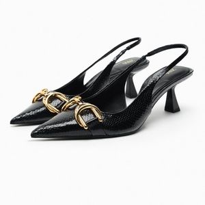 Zara black and gold sling back heels. Heel height: 2.6 inches. Shoe size: 6.5